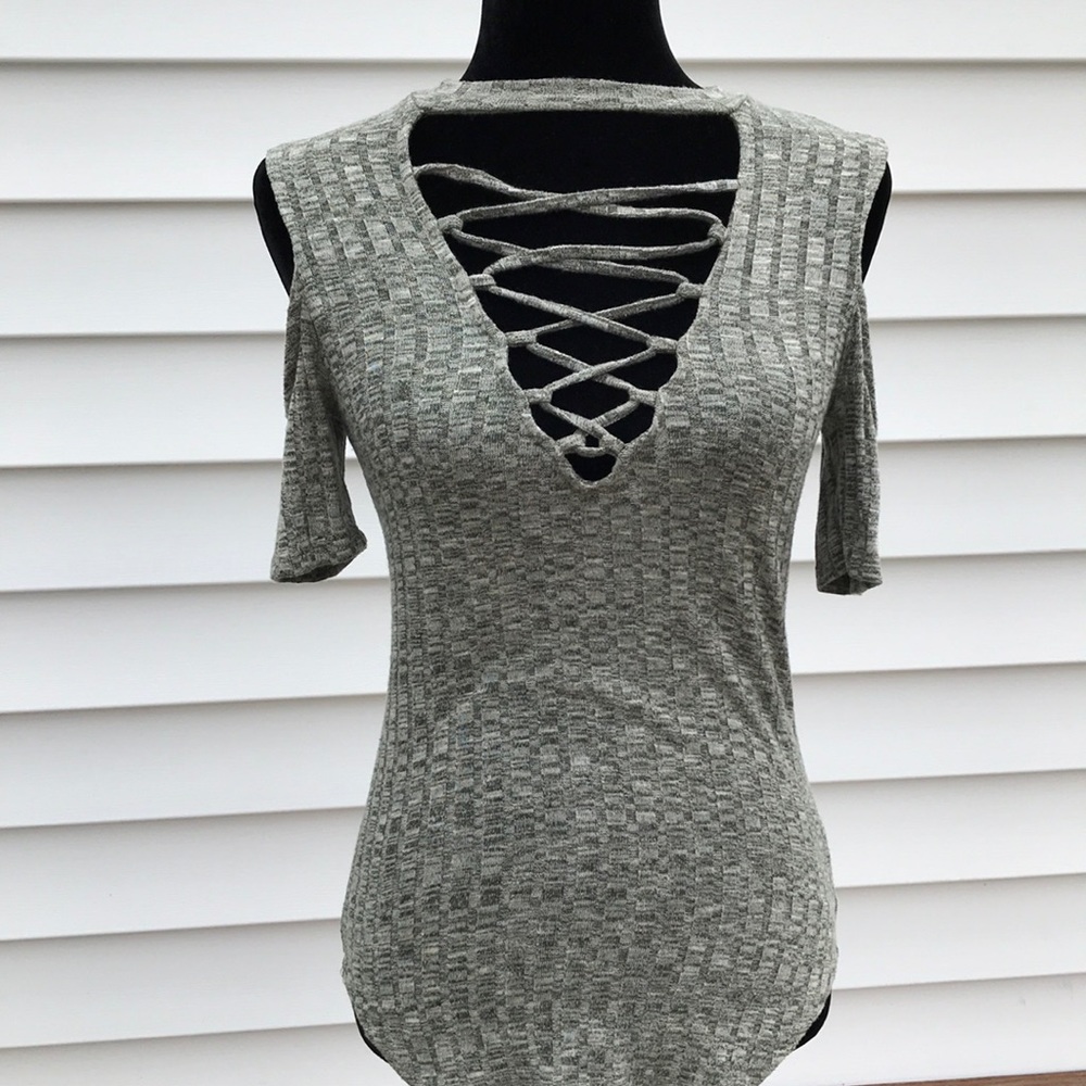 Women’s small cute low cut top. Cold shoulder